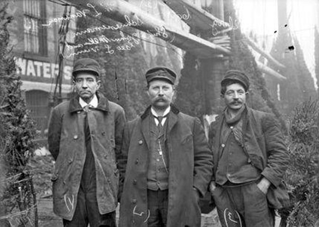 Historical photo of three men.