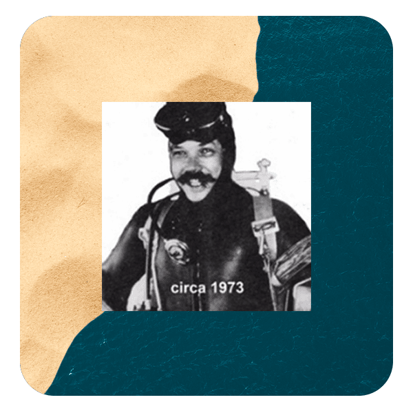 Headshot of John Richard Steele wearing a diving suiit.