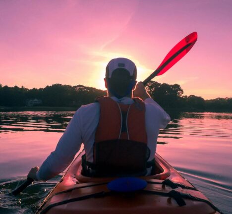 Kayaking at sunset.